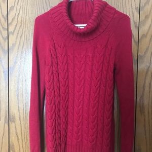 Red cable knit sweater.